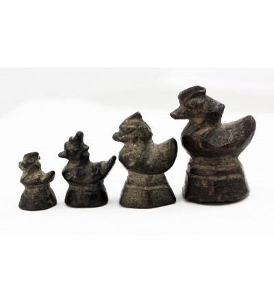 Burma. A set of four Burmese bronze opium weights, depicting the sacred duck "Hintha", 2, 1, 1/2, 1/4 Baht